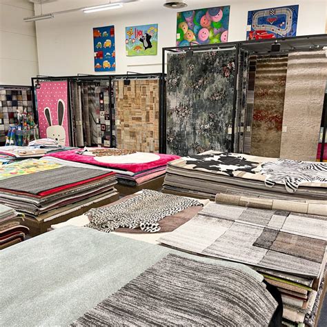 Sortiment podlahových krytin v prodejně Koberce Breno