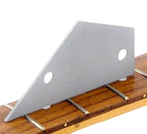 Nastavenie výšky strún na kobylkách typu Tune-o-matic a Strat®