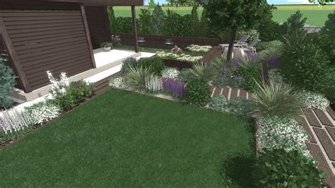 Záhrada s dokončenými obrubníkmi a chodníkmi