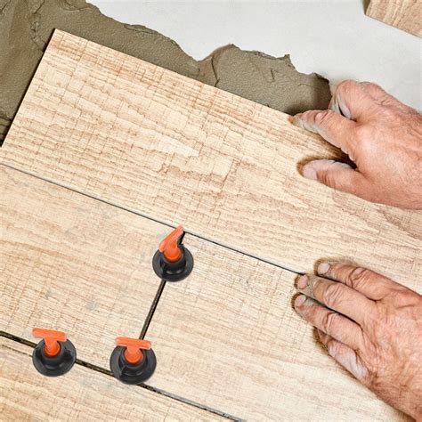 Sada klinov a klieští pre nivelačný systém