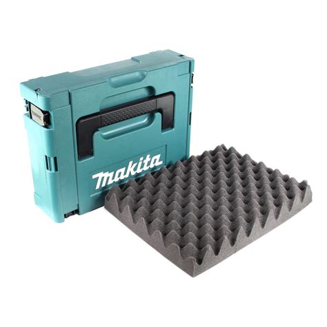 Tyrkysový plechový kufor Makita v dielni