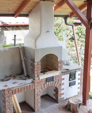 Rohový murovaný záhradný krb