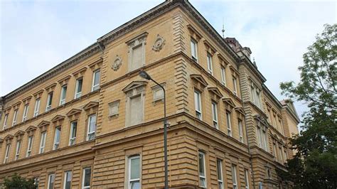 Historická budova a logo spoločnosti Geberit