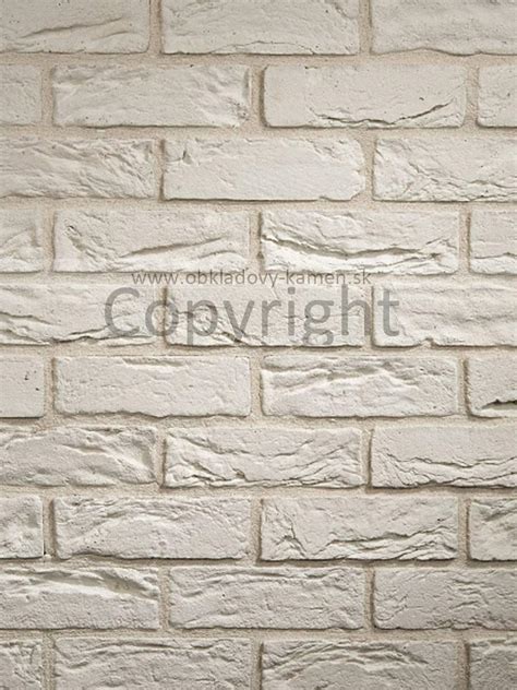 biely tehlový obklad v obývacej izbe