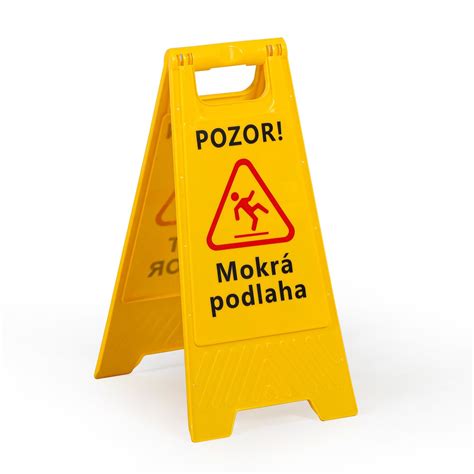 Žltá výstražná tabuľa s nápisom 