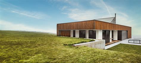 moderný bungalov s dreveným obkladom a veľkými oknami