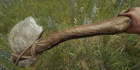 Ilustrácia crafted bow a crafted axe v hre The Forest